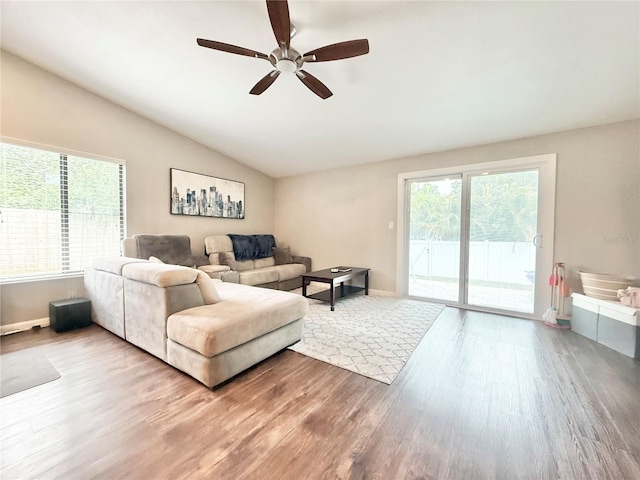 630 Timber Bay Cir W, Oldsmar, FL 34677 - living room featuring wood finished floors, a ceiling fan, and vaulted ceiling