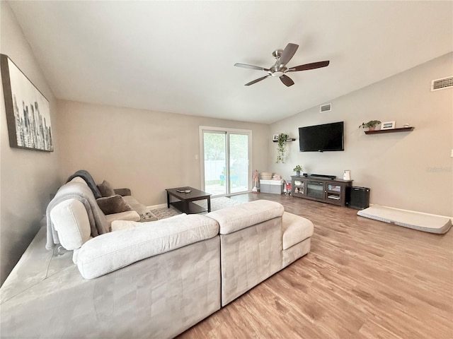 630 Timber Bay Cir W, Oldsmar, FL 34677 - living area with lofted ceiling, ceiling fan, and wood finished floors