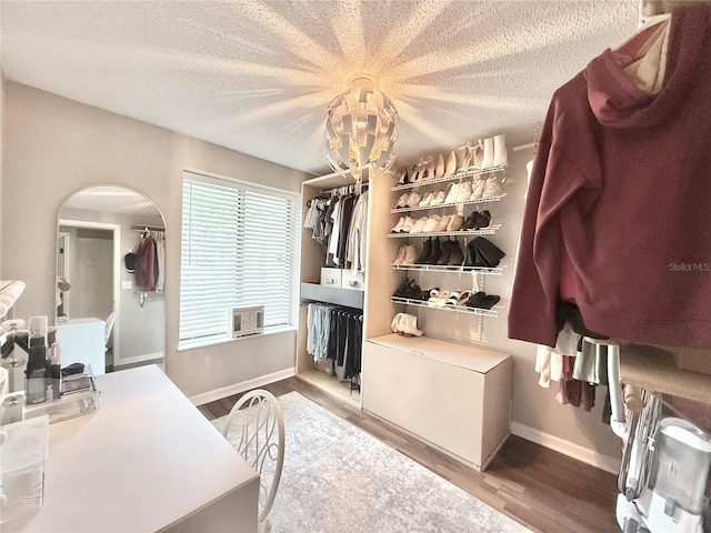 630 Timber Bay Cir W, Oldsmar, FL 34677 - walk in closet featuring arched walkways and wood finished floors
