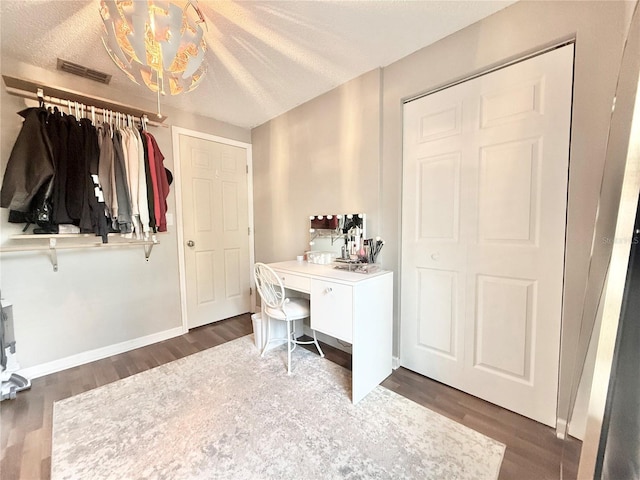 630 Timber Bay Cir W, Oldsmar, FL 34677 - office space with wood finished floors, a textured ceiling, and a chandelier