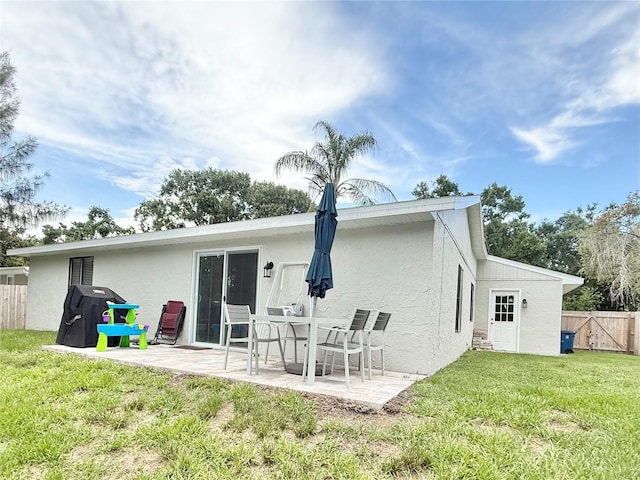 630 Timber Bay Cir W, Oldsmar, FL 34677 - rear view of house with a patio area and stucco siding