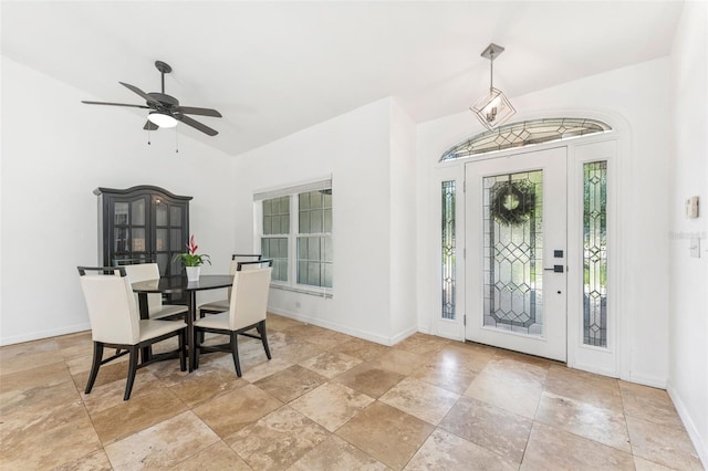 3509 Country Creek Ln, Valrico, FL 33596 - entryway featuring stone finish flooring, vaulted ceiling, and ceiling fan