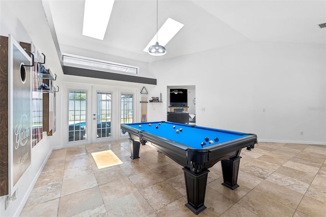 3509 Country Creek Ln, Valrico, FL 33596 - playroom featuring a skylight, french doors, high vaulted ceiling, stone finish flooring, and billiards