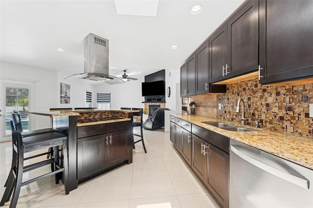 3509 Country Creek Ln, Valrico, FL 33596 - kitchen featuring stainless steel dishwasher, island range hood, a breakfast bar, ceiling fan, and decorative backsplash