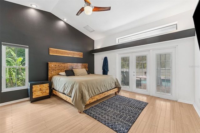 3509 Country Creek Ln, Valrico, FL 33596 - bedroom featuring high vaulted ceiling, access to exterior, french doors, light wood finished floors, and a ceiling fan