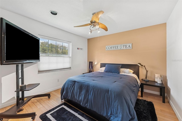 3509 Country Creek Ln, Valrico, FL 33596 - bedroom featuring wood finished floors and a ceiling fan