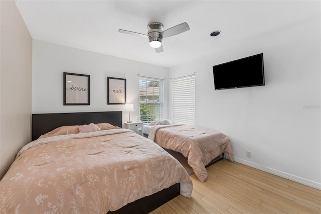3509 Country Creek Ln, Valrico, FL 33596 - bedroom featuring wood finished floors and ceiling fan