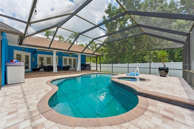 3509 Country Creek Ln, Valrico, FL 33596 - view of pool featuring french doors, a patio, glass enclosure, and a pool with connected hot tub