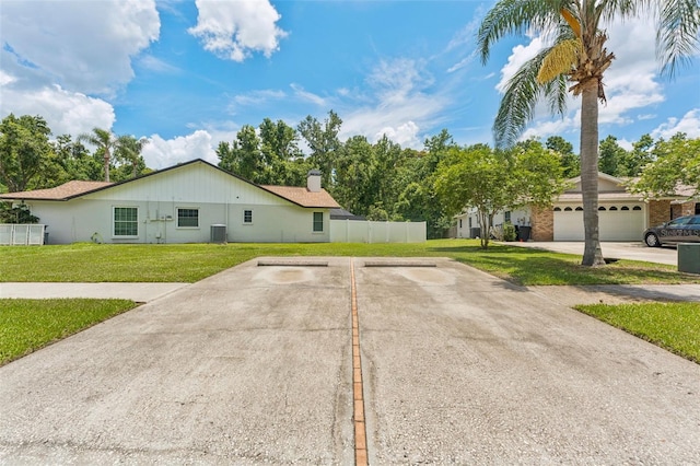 3509 Country Creek Ln, Valrico, FL 33596 - view of front facade with uncovered parking and a chimney