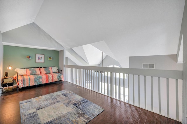 3301 Haviland Ct Unit 301, Palm Harbor, FL 34684 - bedroom with vaulted ceiling and wood finished floors