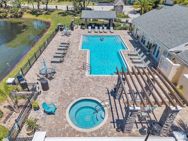 3301 Haviland Ct Unit 301, Palm Harbor, FL 34684 - community pool featuring a patio area, a community hot tub, and a water view