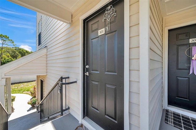3301 Haviland Ct Unit 301, Palm Harbor, FL 34684 - property entrance featuring a porch