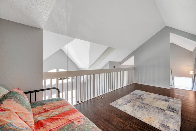 3301 Haviland Ct Unit 301, Palm Harbor, FL 34684 - sitting room featuring vaulted ceiling and wood finished floors