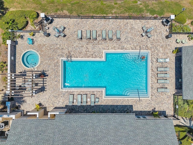 3301 Haviland Ct Unit 301, Palm Harbor, FL 34684 - drone / aerial view of a pool