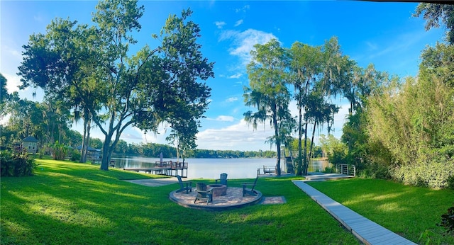 20111 County Line Rd, Lutz, FL 33558 - surrounding community featuring a fire pit, a lawn, and a water view