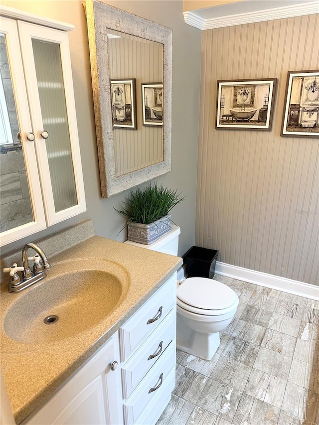 20111 County Line Rd, Lutz, FL 33558 - half bathroom with vanity, wooden walls, and crown molding