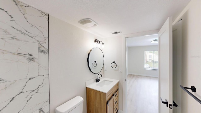 3232 Lake Pine Way E Unit A2, Tarpon Springs, FL 34688 - bathroom with vanity and toilet