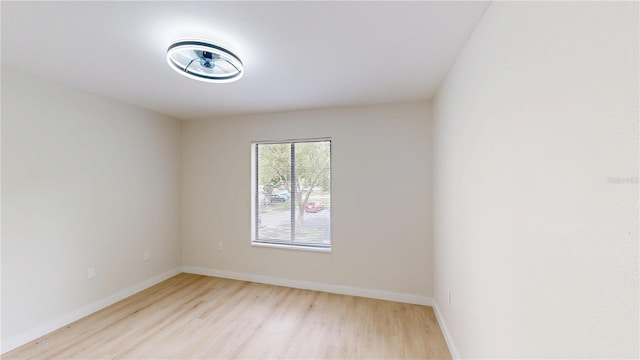 3232 Lake Pine Way E Unit A2, Tarpon Springs, FL 34688 - unfurnished room with light wood-type flooring