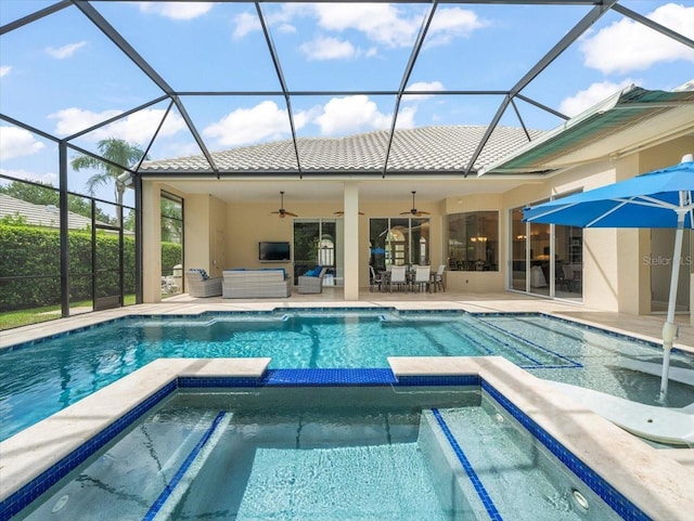 6905 Arabian Rd, Odessa, FL 33556 - view of swimming pool featuring an outdoor living space, ceiling fan, a pool with connected hot tub, a patio, and glass enclosure