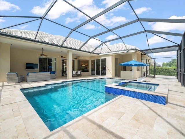 6905 Arabian Rd, Odessa, FL 33556 - view of pool with ceiling fan, a patio, outdoor lounge area, a pool with connected hot tub, and a lanai