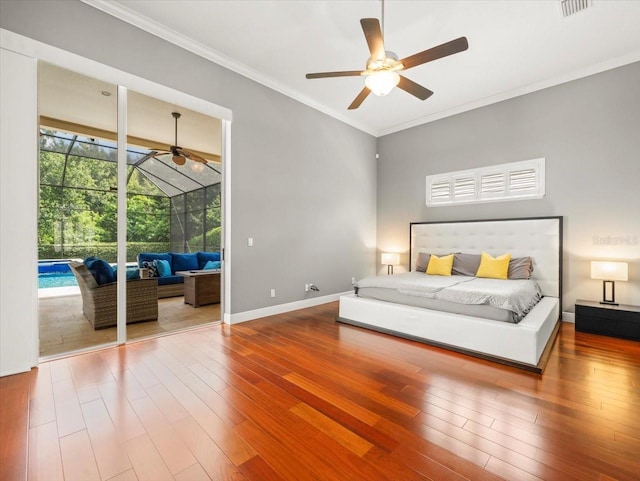 6905 Arabian Rd, Odessa, FL 33556 - bedroom with a sunroom, access to outside, wood finished floors, ornamental molding, and ceiling fan