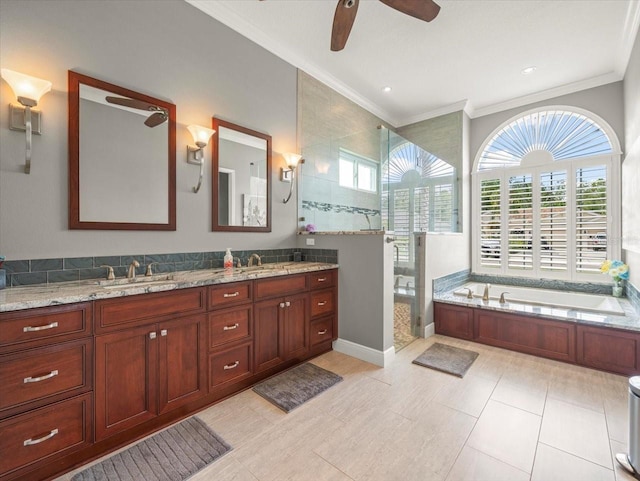 6905 Arabian Rd, Odessa, FL 33556 - bathroom with a ceiling fan, a stall shower, a bath, crown molding, and double vanity