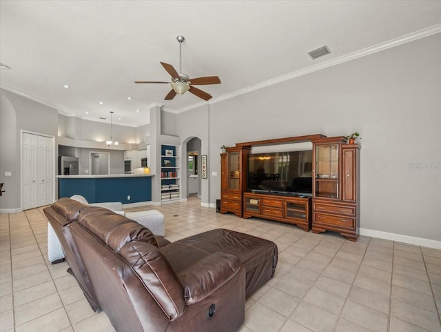 6905 Arabian Rd, Odessa, FL 33556 - living area featuring arched walkways, light tile patterned floors, a ceiling fan, crown molding, and recessed lighting