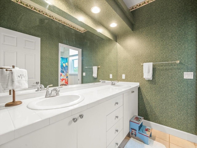 6905 Arabian Rd, Odessa, FL 33556 - bathroom with double vanity, tile patterned flooring, and recessed lighting