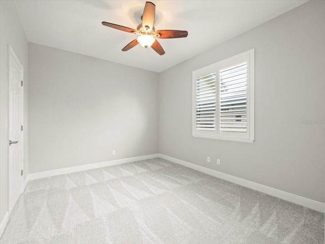 6905 Arabian Rd, Odessa, FL 33556 - spare room with light carpet and a ceiling fan