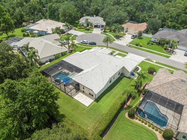 6905 Arabian Rd, Odessa, FL 33556 - aerial perspective of suburban area with a pool area