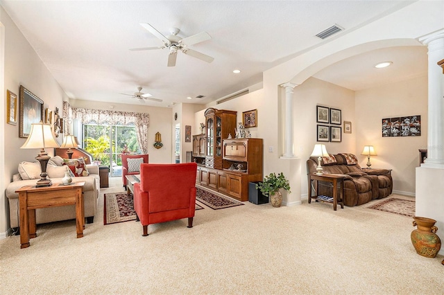 6041 Sandhill Ridge Dr, Lithia, FL 33547 - living room featuring ornate columns, light colored carpet, ceiling fan, arched walkways, and recessed lighting