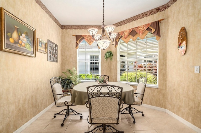 6041 Sandhill Ridge Dr, Lithia, FL 33547 - tiled dining space featuring a chandelier and baseboards