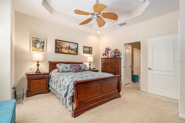 6041 Sandhill Ridge Dr, Lithia, FL 33547 - bedroom with light carpet, a raised ceiling, and ceiling fan