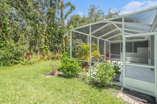 6041 Sandhill Ridge Dr, Lithia, FL 33547 - view of green lawn featuring glass enclosure