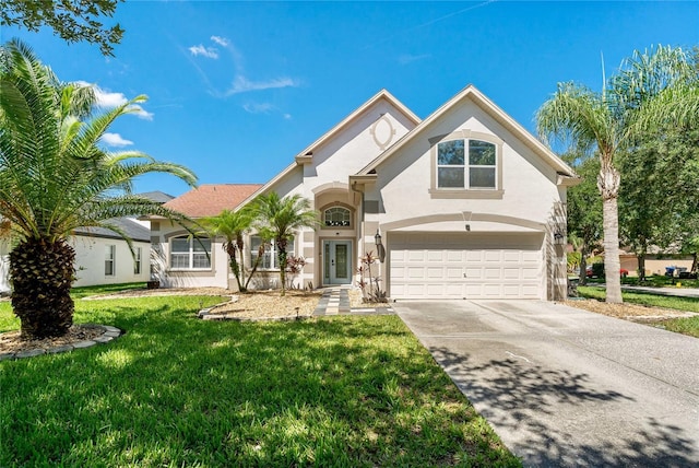 19206 Ivy Oak Way, Tampa, FL 33647 - view of front of property featuring stucco siding, an attached garage, concrete driveway, and a front lawn