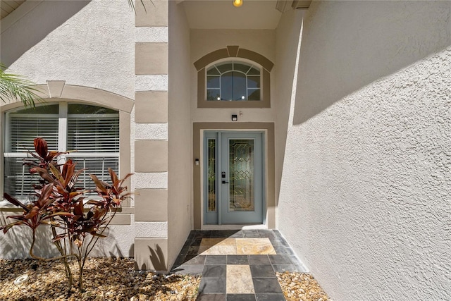 19206 Ivy Oak Way, Tampa, FL 33647 - doorway to property featuring stucco siding