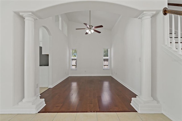 19206 Ivy Oak Way, Tampa, FL 33647 - empty room with ceiling fan, vaulted ceiling, hardwood / wood-style floors, and arched walkways