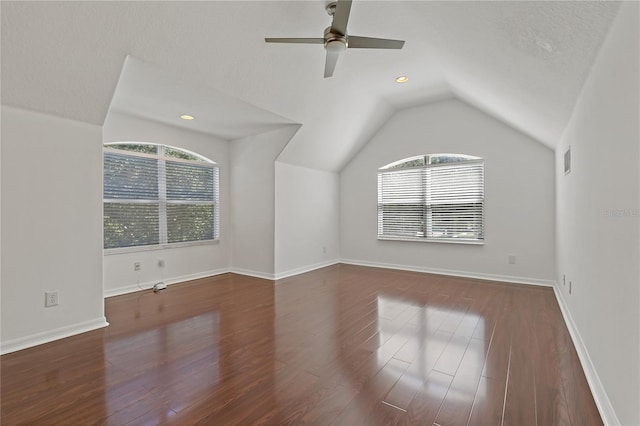 19206 Ivy Oak Way, Tampa, FL 33647 - additional living space with healthy amount of natural light, a ceiling fan, wood finished floors, and vaulted ceiling