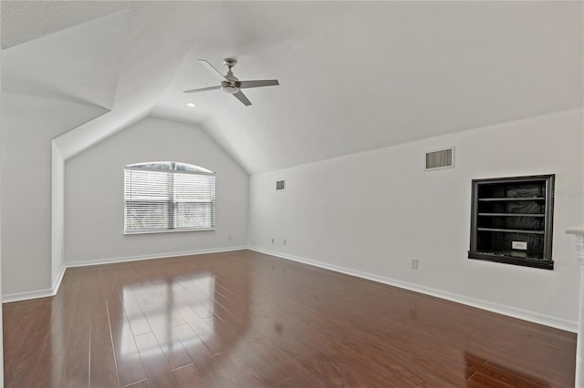 19206 Ivy Oak Way, Tampa, FL 33647 - additional living space featuring ceiling fan, vaulted ceiling, dark wood-style floors, and built in shelves