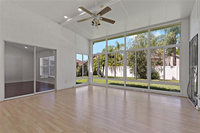 19206 Ivy Oak Way, Tampa, FL 33647 - unfurnished sunroom featuring healthy amount of natural light, a water view, and beam ceiling