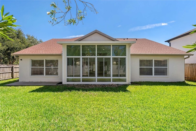 19206 Ivy Oak Way, Tampa, FL 33647 - rear view of house with stucco siding, a sunroom, and roof with shingles