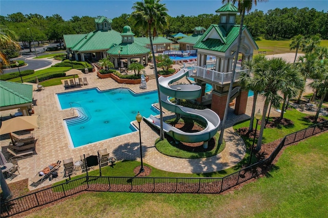19206 Ivy Oak Way, Tampa, FL 33647 - community pool featuring a gazebo, a water slide, a patio, and view of wooded area
