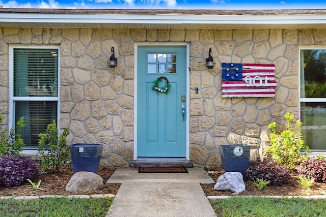 901 Strawberry Ln, Brandon, FL 33511 - doorway to property featuring stone siding