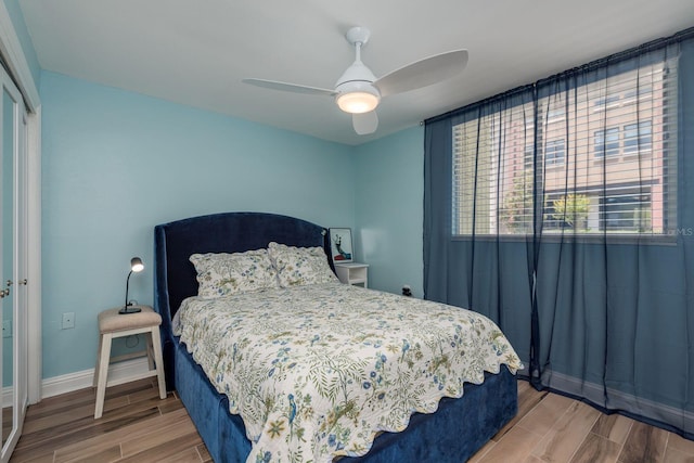 1301 S Howard Ave Unit A9, Tampa, FL 33606 - bedroom featuring wood finished floors, a closet, and ceiling fan