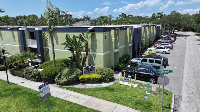 1301 S Howard Ave Unit A9, Tampa, FL 33606 - view of building exterior with uncovered parking