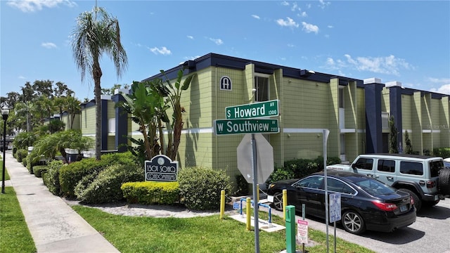 1301 S Howard Ave Unit A9, Tampa, FL 33606 - view of building exterior featuring uncovered parking