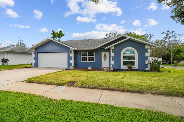 8823 Aruba Ln, Port Richey, FL 34668 - ranch-style home with a garage, driveway, stucco siding, and a front yard