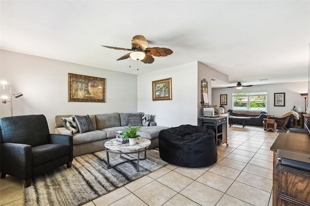 8823 Aruba Ln, Port Richey, FL 34668 - living area with a ceiling fan and light tile patterned flooring