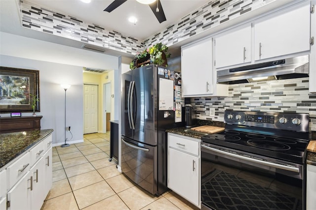 8823 Aruba Ln, Port Richey, FL 34668 - kitchen featuring appliances with stainless steel finishes, under cabinet range hood, a ceiling fan, tasteful backsplash, and white cabinets