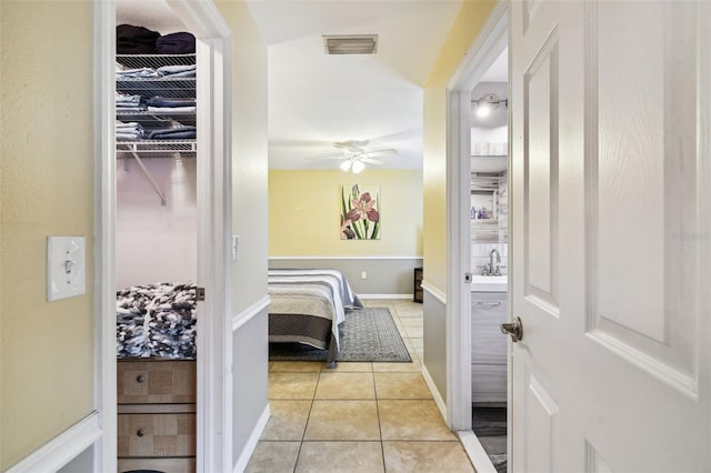 8823 Aruba Ln, Port Richey, FL 34668 - hall with light tile patterned floors and baseboards